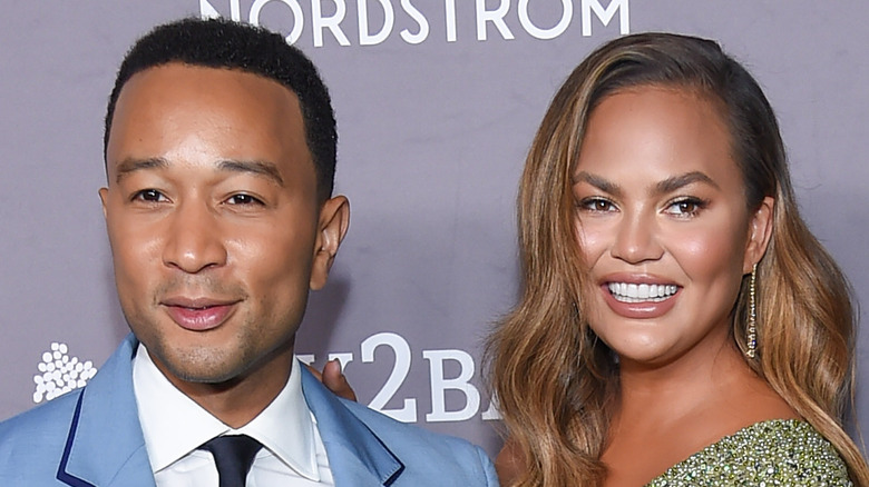 John Legend and Chrissy Teigen smiling