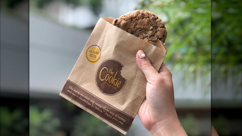 hand holding DoubleTree cookie