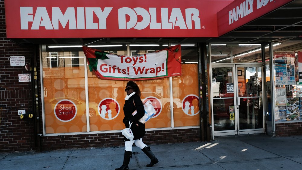 customer at dollar store in struggling area