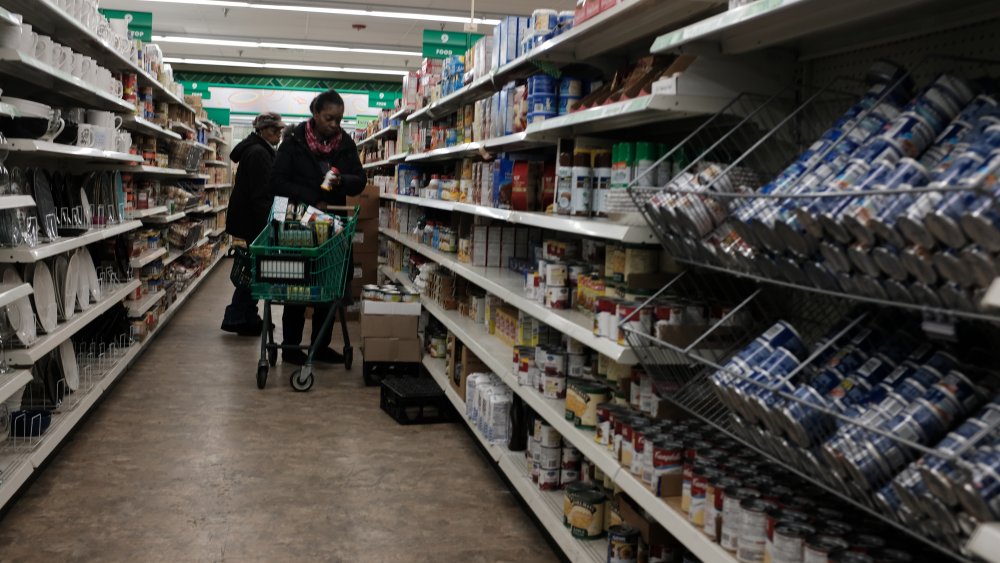 people shopping in a dollar store