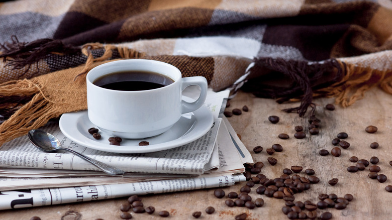 mug of coffee and beans