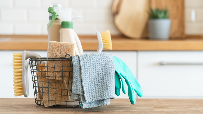 Basket of kitchen cleaning supplies