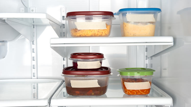 containers of leftovers in fridge