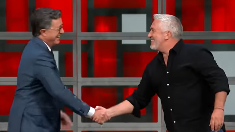 paul hollywood and stephen colbert shaking hands