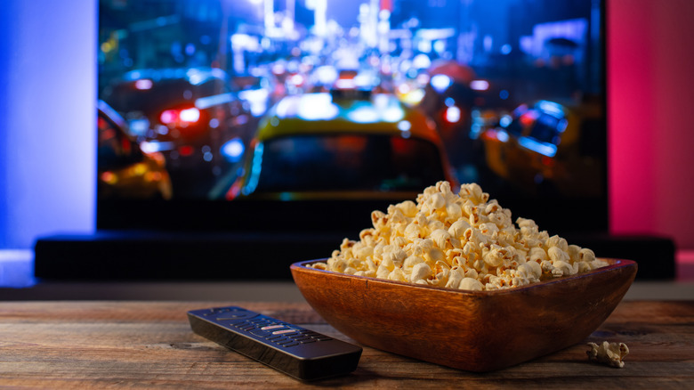 Popcorn in bowl in front of TV