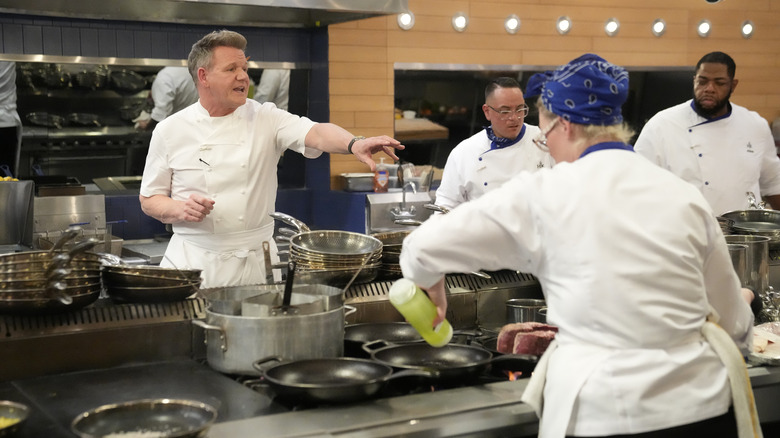 Gordon Ramsay instructing chefs on Hell's Kitchen set