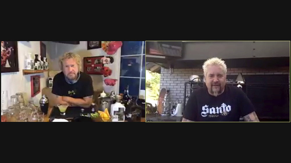 Guy Fieri filming with a guest