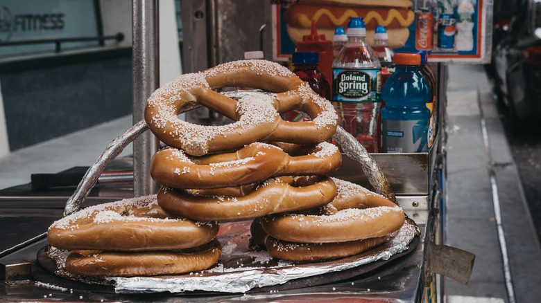 Pretzels stacked on a cart