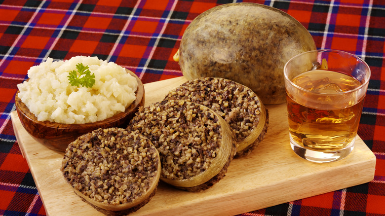 Sliced haggis and whiskey