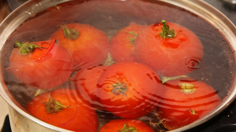 Tomatoes cooking in pot