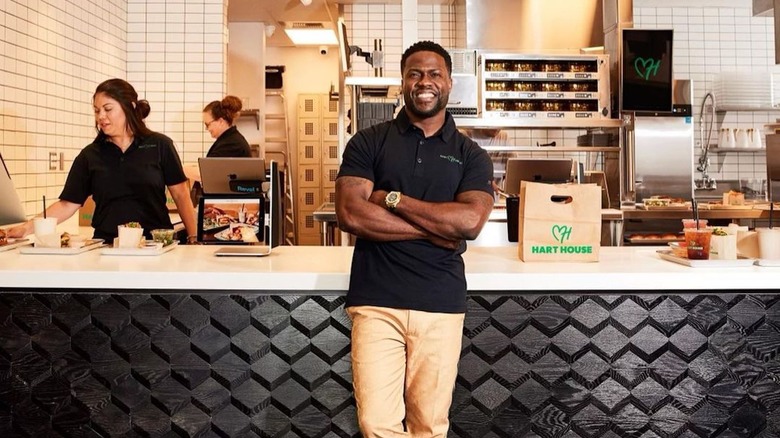 Kevin Hart standing at Hart House counter