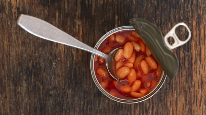 Tinned beans with spoon
