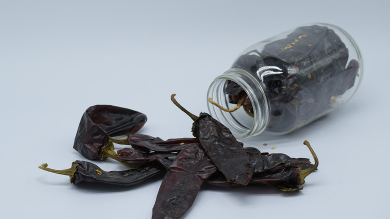 Dried chiles in a jar