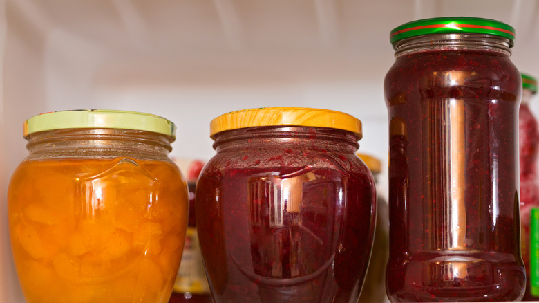 Jars of jelly in the fridge