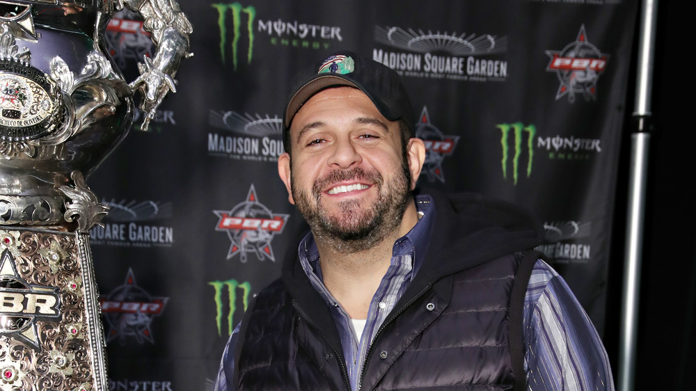 Adam Richman of Man v. Food in a baseball cap