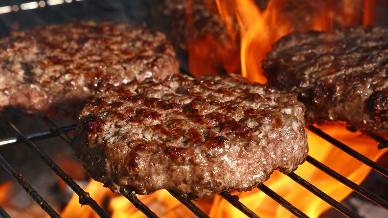 burger patties on grill