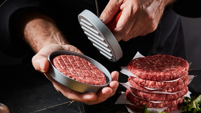 forming burger patties with press