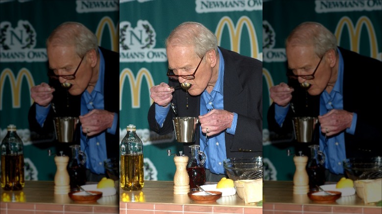 Paul Newman making and eating salad dressing