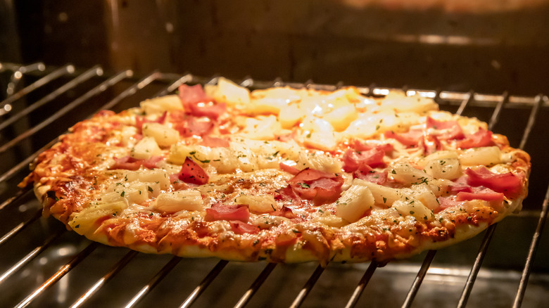 frozen pizza in oven