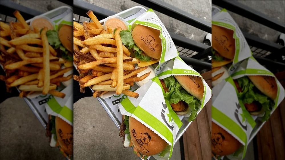 A burger and other food items from BurgerFi