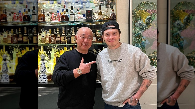 Brooklyn Beckham and Nobu Matsuhisa smiling