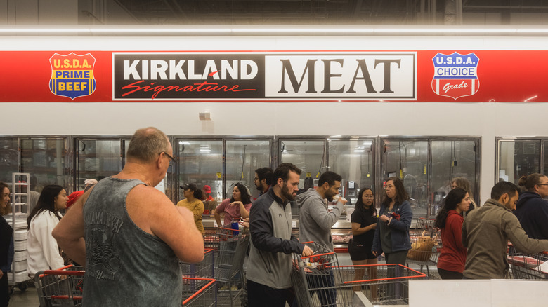 costco shoppers in meat department