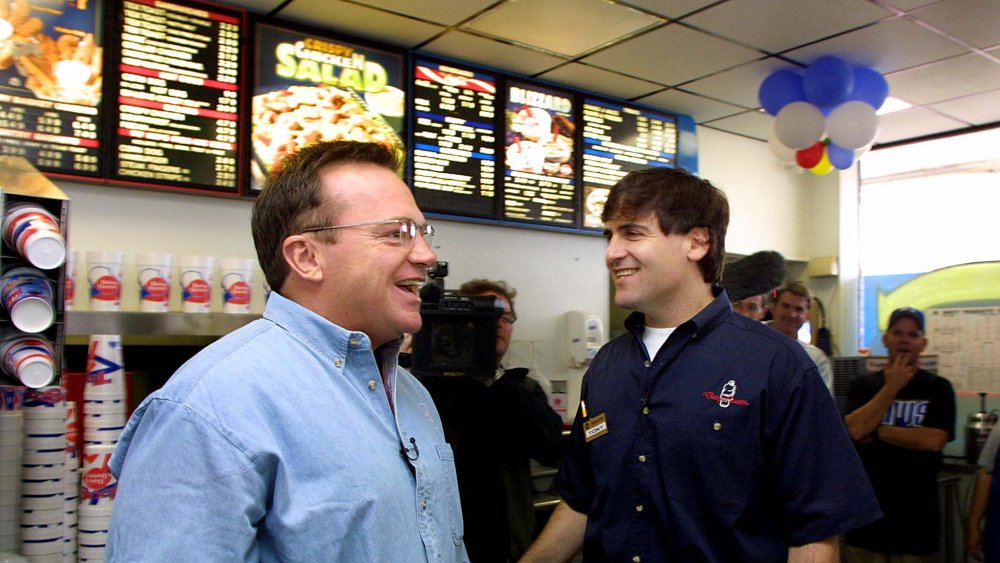 Tom Arnold and Mark Cuban behind a Dairy Queen counter