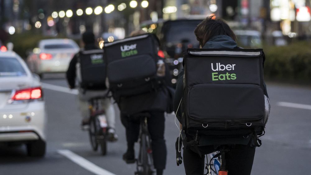 Uber Eats workers riding bikes