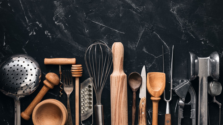 basic kitchen tools laid out on a marble board