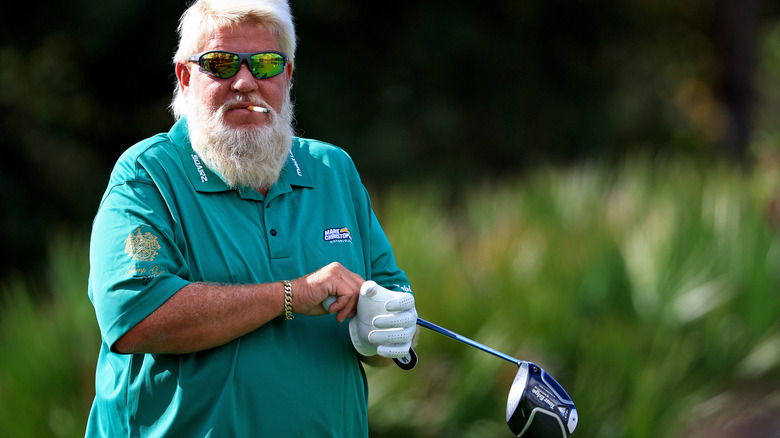 John Daly smoking and golfing