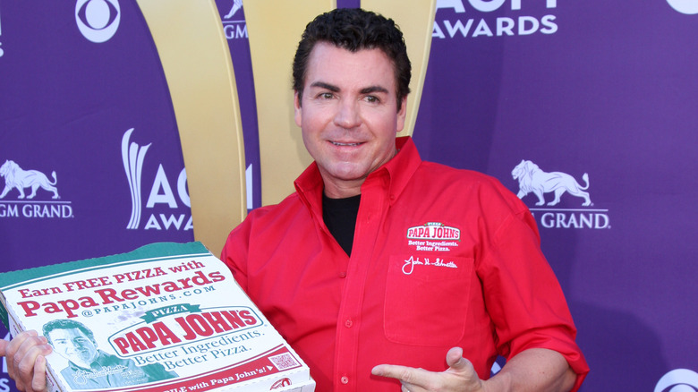 John Schnatter in a red shirt