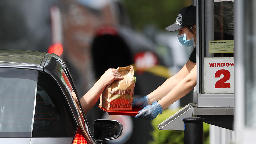 Burger King employee with customer