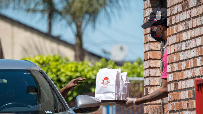 Wendy's employee at drive-thru