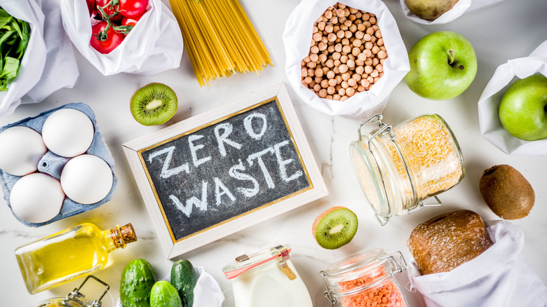 chalk board with zero waste written on it surrounded by food