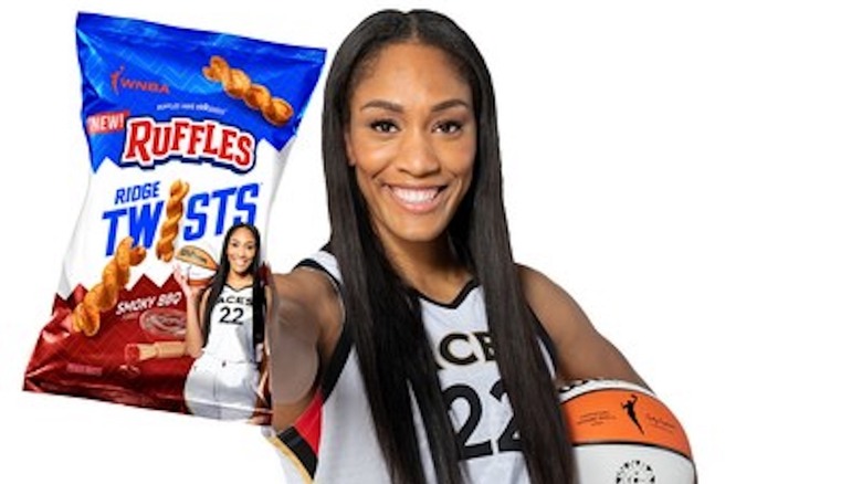 A'ja Wilson holding bag of Ruffles Ridge Twists