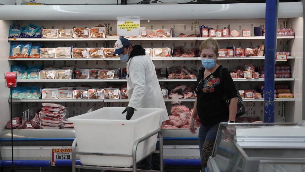 Stocking the meat shelves