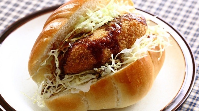 Croquette Sando on a white plate 