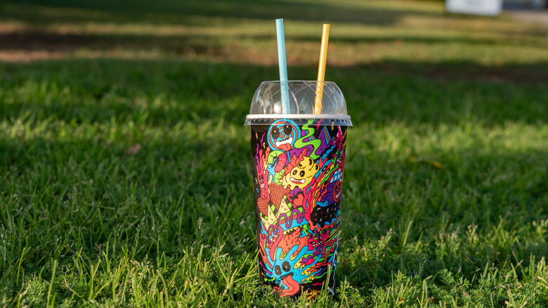 A Slurpee on grass