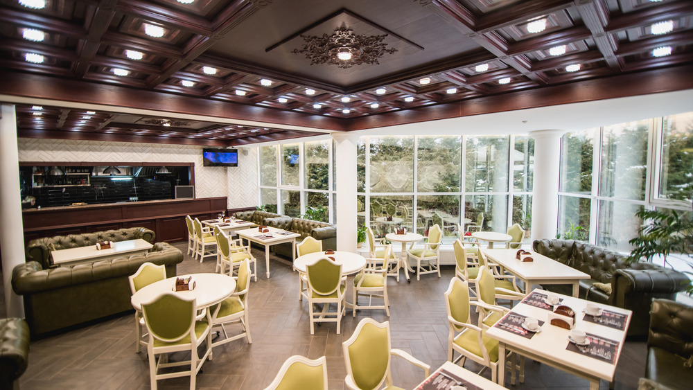 inside a restaurant with an open kitchen