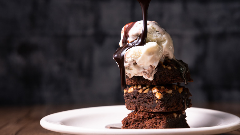 a stack of brownies with ice cream