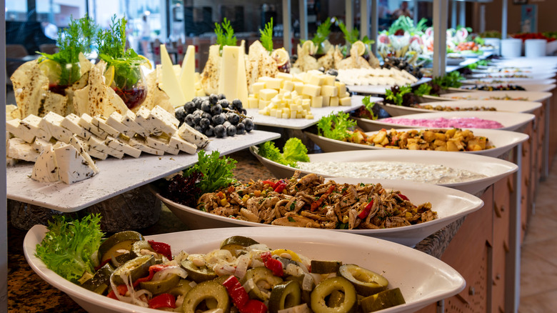 buffet with cheese and vegetables