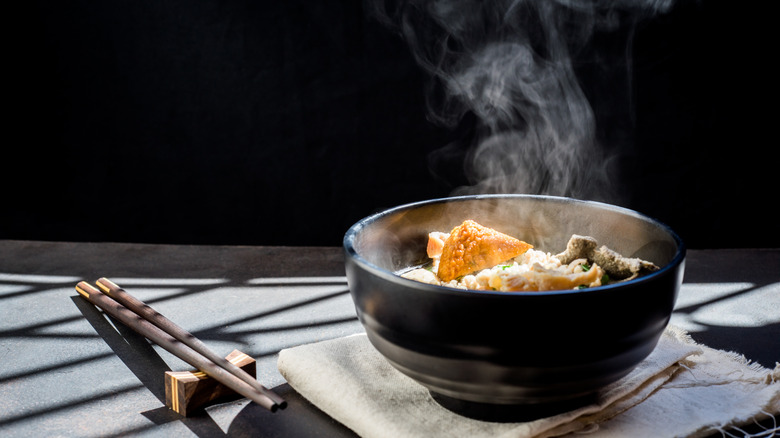 Bowl of food giving off steam