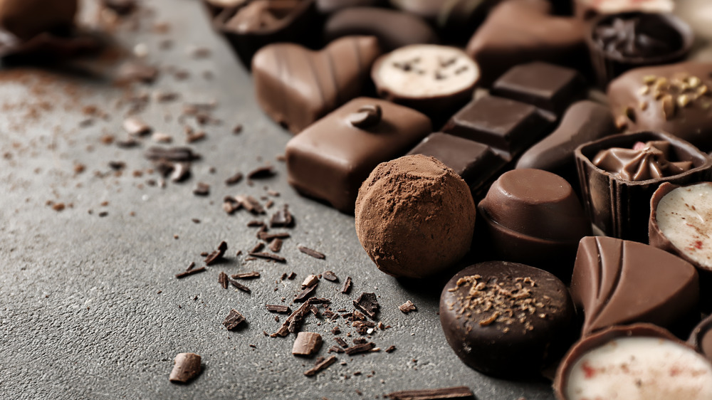 Various chocolates on black background