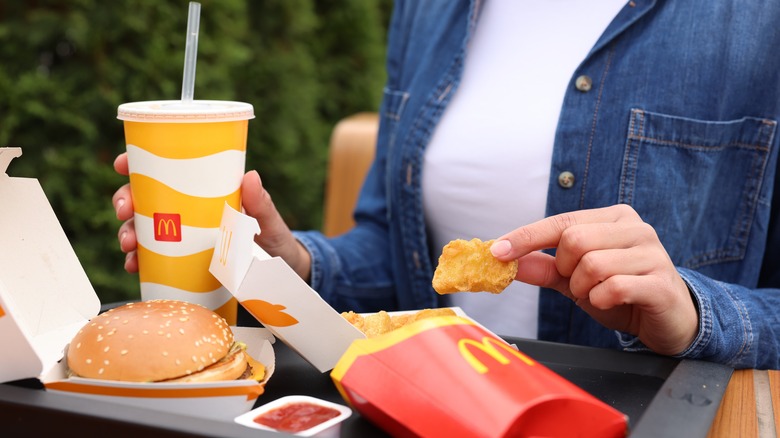 person eating McDonald's meal