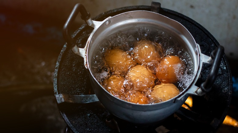 eggs boiling in pan