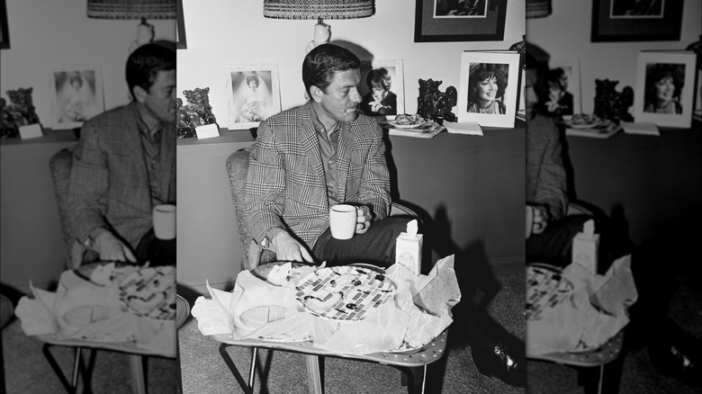 Dick Van Dyke eating at a TV tray