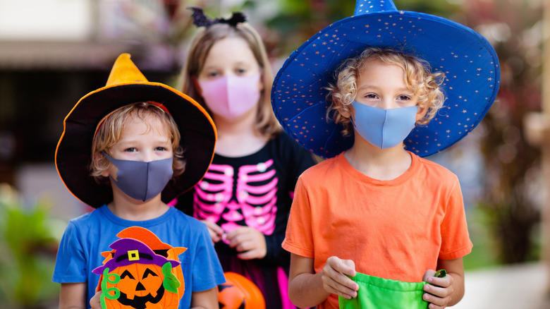 Trick or Treaters with masks