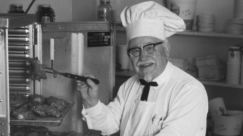 Colonel Sanders cooking KFC chicken