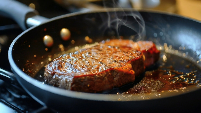 Steak searing in pan