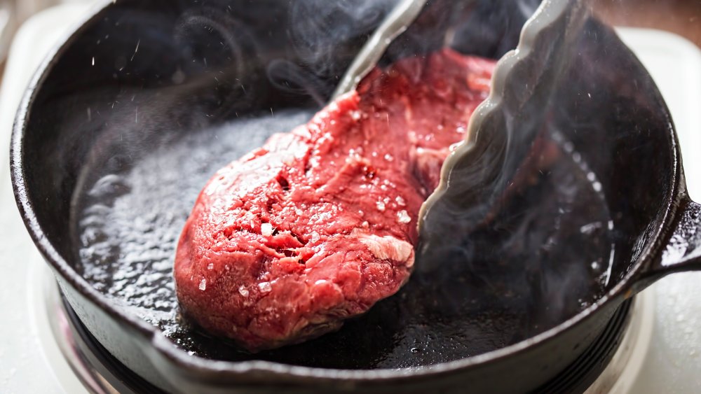 searing a steak 